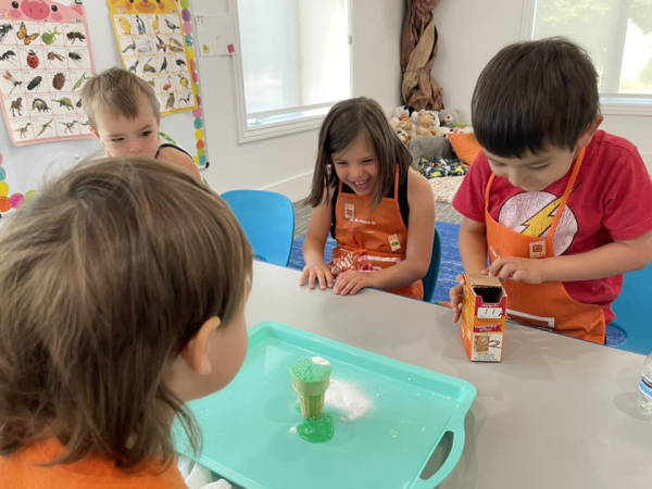 Kids creating science experiment